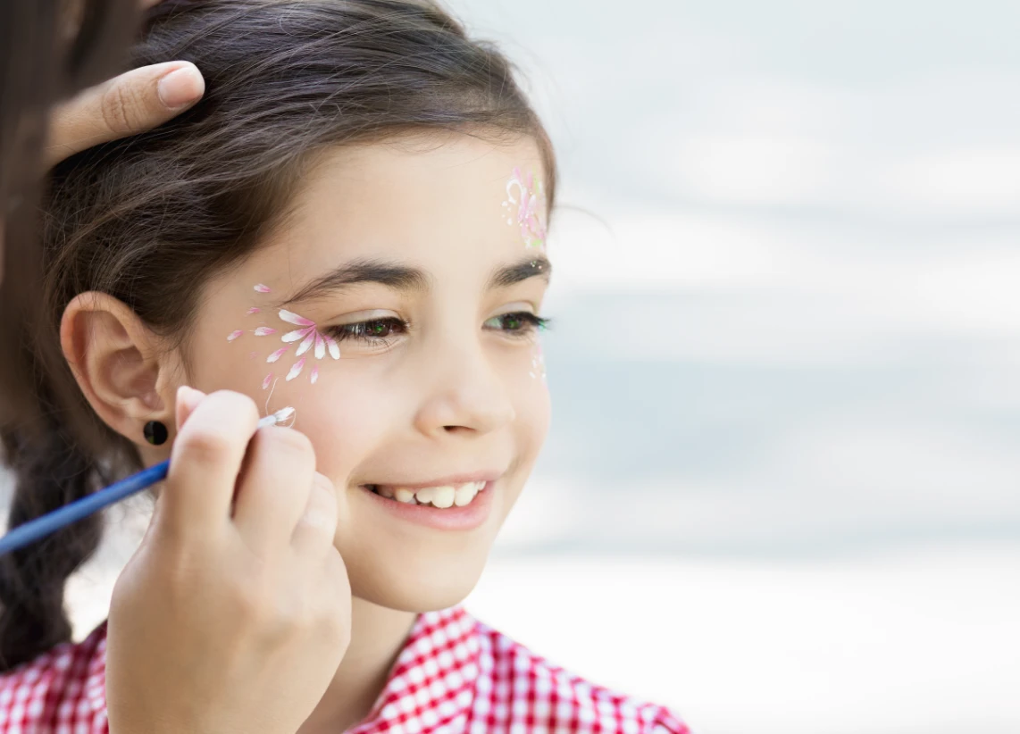 little-girl-getting-her-face-painted-by-face-paint-2023-11-27-05-02-01-utc